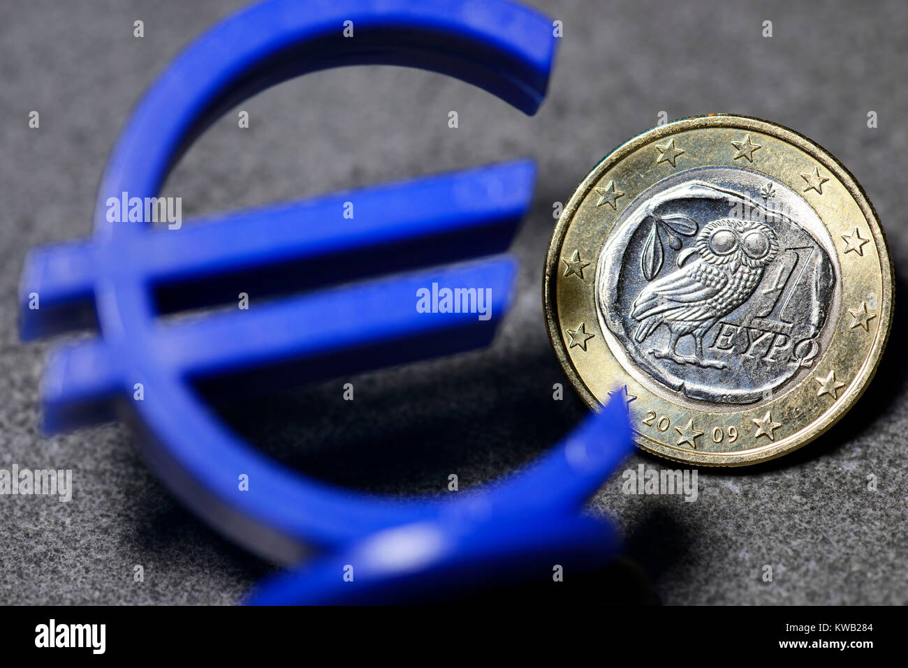 Greek euro-coin one and eurosign, Griechische Ein-Euro-M?nze und Eurozeichen, Griechische Ein-Euro-Muenze und Eurozeichen Stock Photo