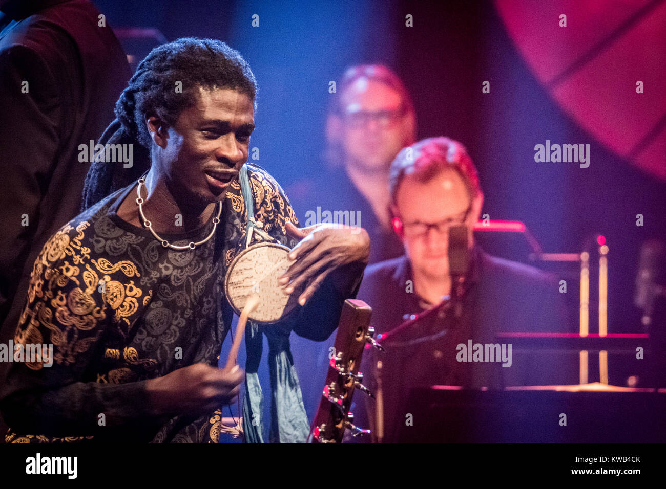 The Gambian musician and kora harp player Dawda Jobarteh (not pictured)) performs live  with percussionists Salieu Dibba (not pictured)  and Bakary Mbengue (pictured) at DR Koncerthuset during P8 Jazz Alive 2017 in Copenhagen. Denmark, 31/03 2017. Stock Photo