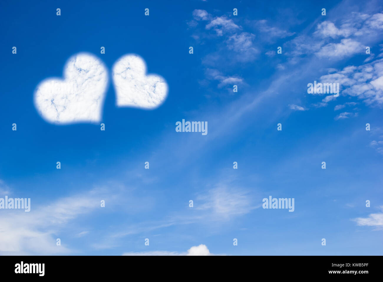 Heart shape clouds on blue sky background with copy space. Valentine ...