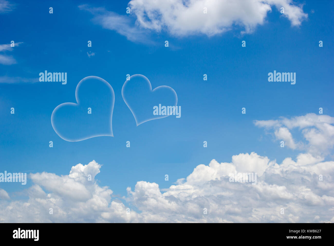 Heart shape clouds on blue sky background with copy space. Valentine ...