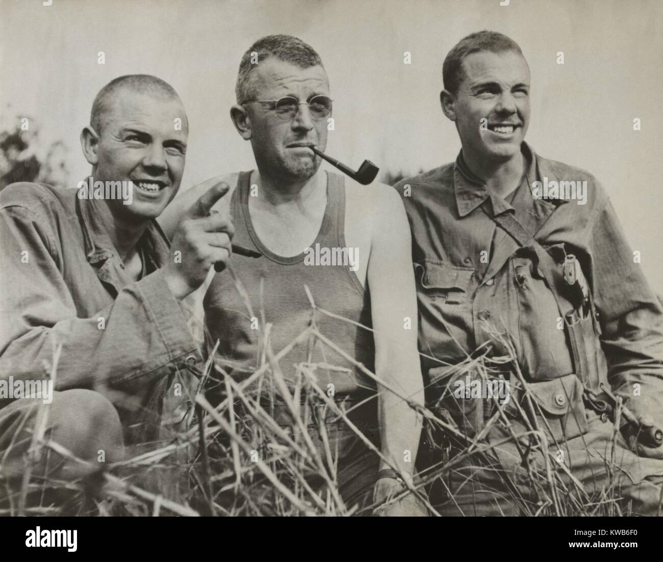 Brig. Gen. Frank Merrill flanked by the Higgins twins Elbert Viron (left) and Albert Byron in 1944. He commanded 'Merrill's Marauders', a special forces unit that operated behind Japanese lines in Burma during World War 2. (BSLOC 2014 8 133) Stock Photo