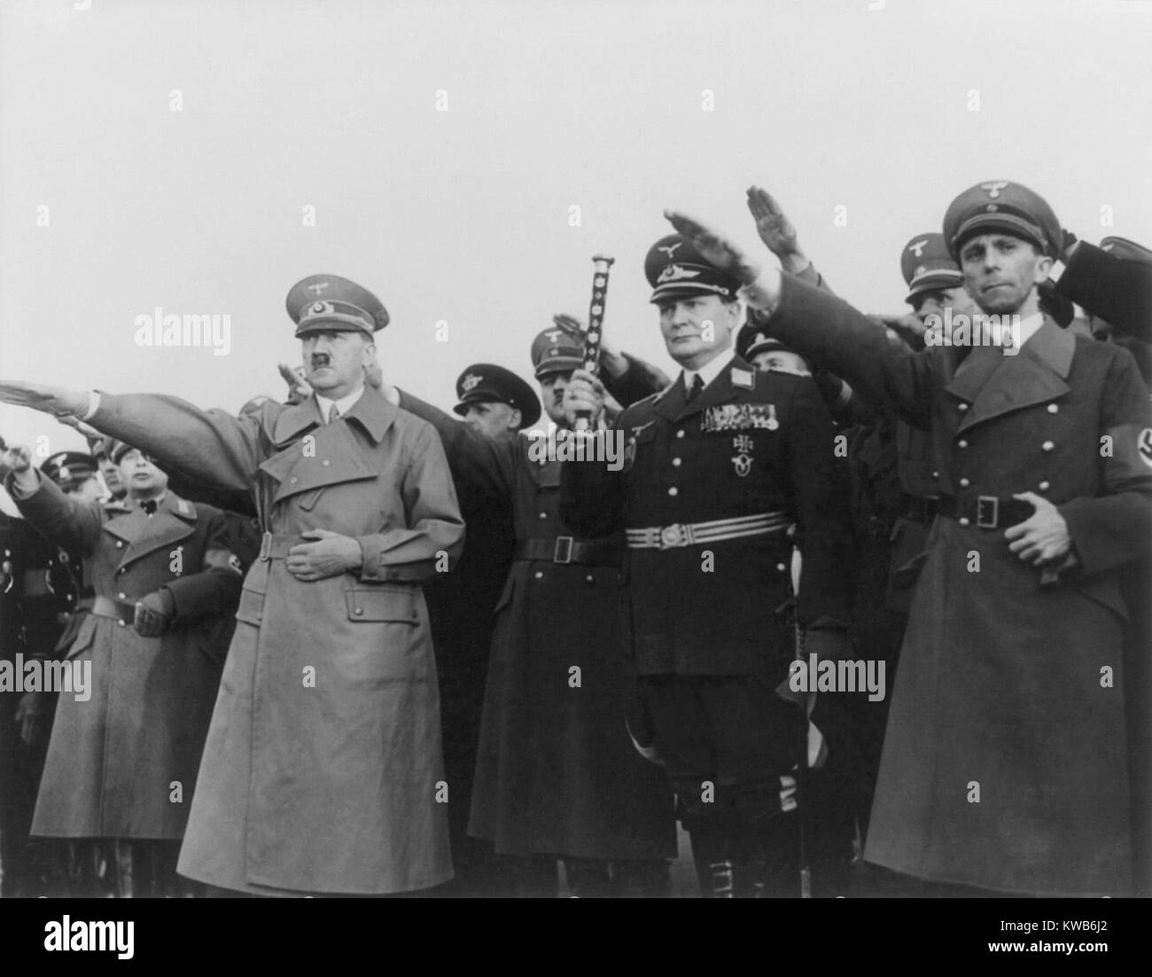 Hitler, with Goering and Goebbels, saluting upon his return from Austria. On the previous day Hitler signed the unification pact annexing Austria into Germany. March 16, 1938, Berlin, Germany. (BSLOC 2014 8 170) Stock Photo