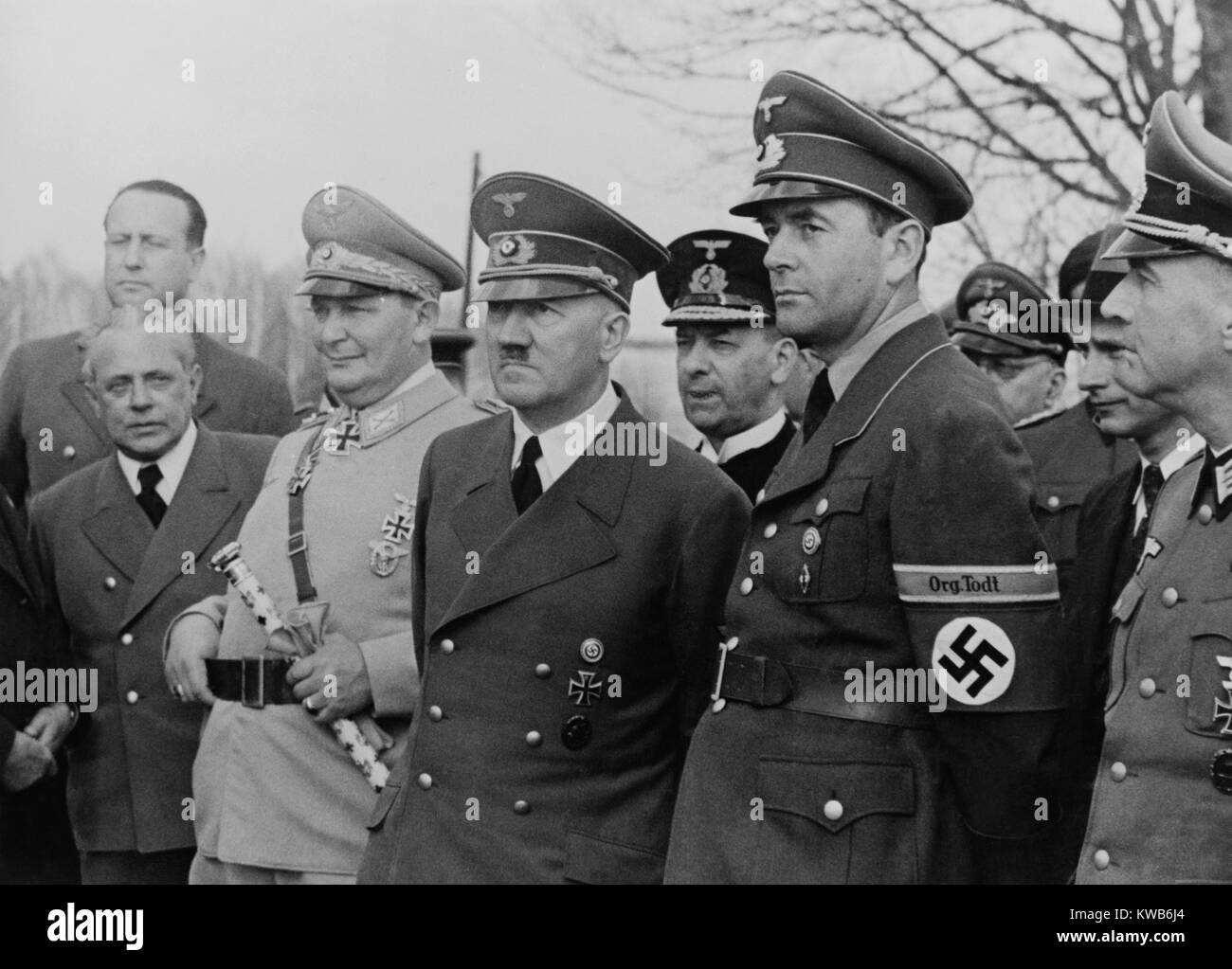 Adolf Hitler, flanked by Hermann Goering, and Albert Speer. Speer was Minister of Armaments and War Production. His 'Org. Tolt' armband refers to German wartime industrial and military engineering works that ran the Nazi slave labor workforce. April 10, 1942. World War 2. (BSLOC 2014 8 171) Stock Photo