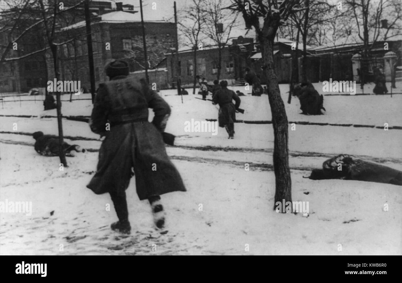 Soviet(Russian) soldiers engaged in hunting down German stragglers in Rostov-on-Don, Russia. During a German retreat in Nov. 1941, the Soviets pushed the Nazis out of the city, achieving the first significant German withdrawal of the World War 2, and the sacking by Hitler of General Gerd von Rundstedt. (BSLOC 2014 8 25) Stock Photo