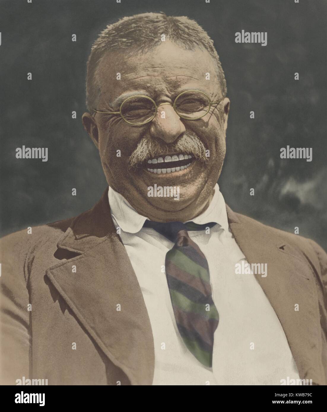 Theodore Roosevelt laughing, c. 1910-1912. Roosevelt returned from his post-presidential African safari to adoring crowds on June 18, 1910. He soon re-entered the public arena with a speaking tour in the Midwest. By early 1911 he began to challenge Presid (BSIC 2016 9 12). 7 Continents History/Everett Collection Stock Photo