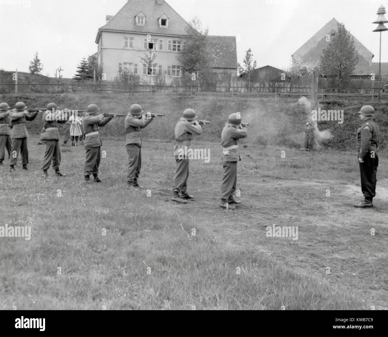 U.S. Army firing squad executed Richard Jarozik in Kitzingen, Germany, April 23, 1945. Jarozik acted as a Nazi spy behind the front lines of the U.S. 7th Army, sabotaging equipment and killing U.S. soldiers. World War 2. (BSLOC 2014 8 102) Stock Photo