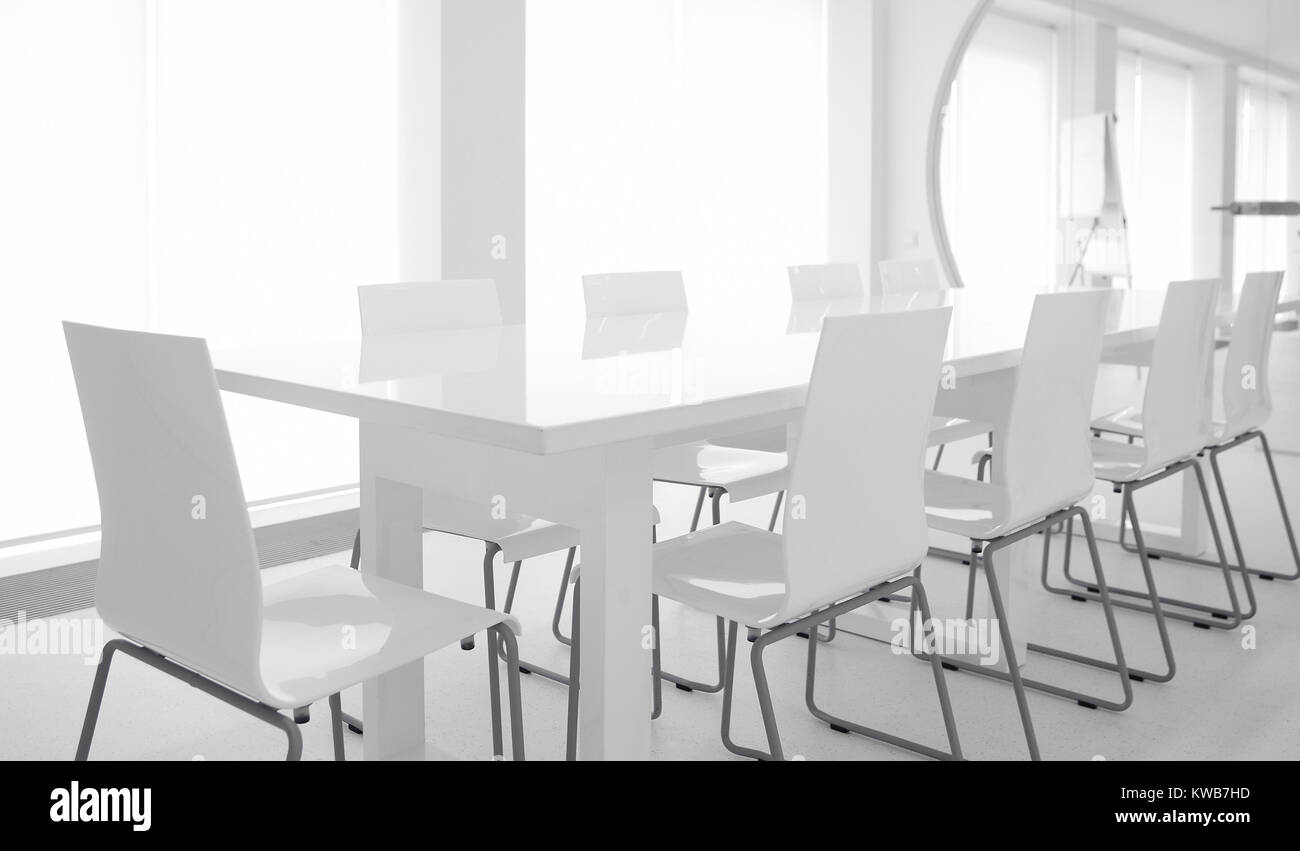 White chairs and glass table Stock Photo Alamy