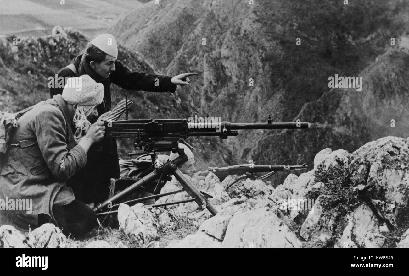 Croatian militia men and Muslims fighting, along with the Germans, against Tito's partisans. The combat takes place in the Bosnian mountains, 1944, in Yugoslavia, during World War 2. (BSLOC 2014 10 57) Stock Photo