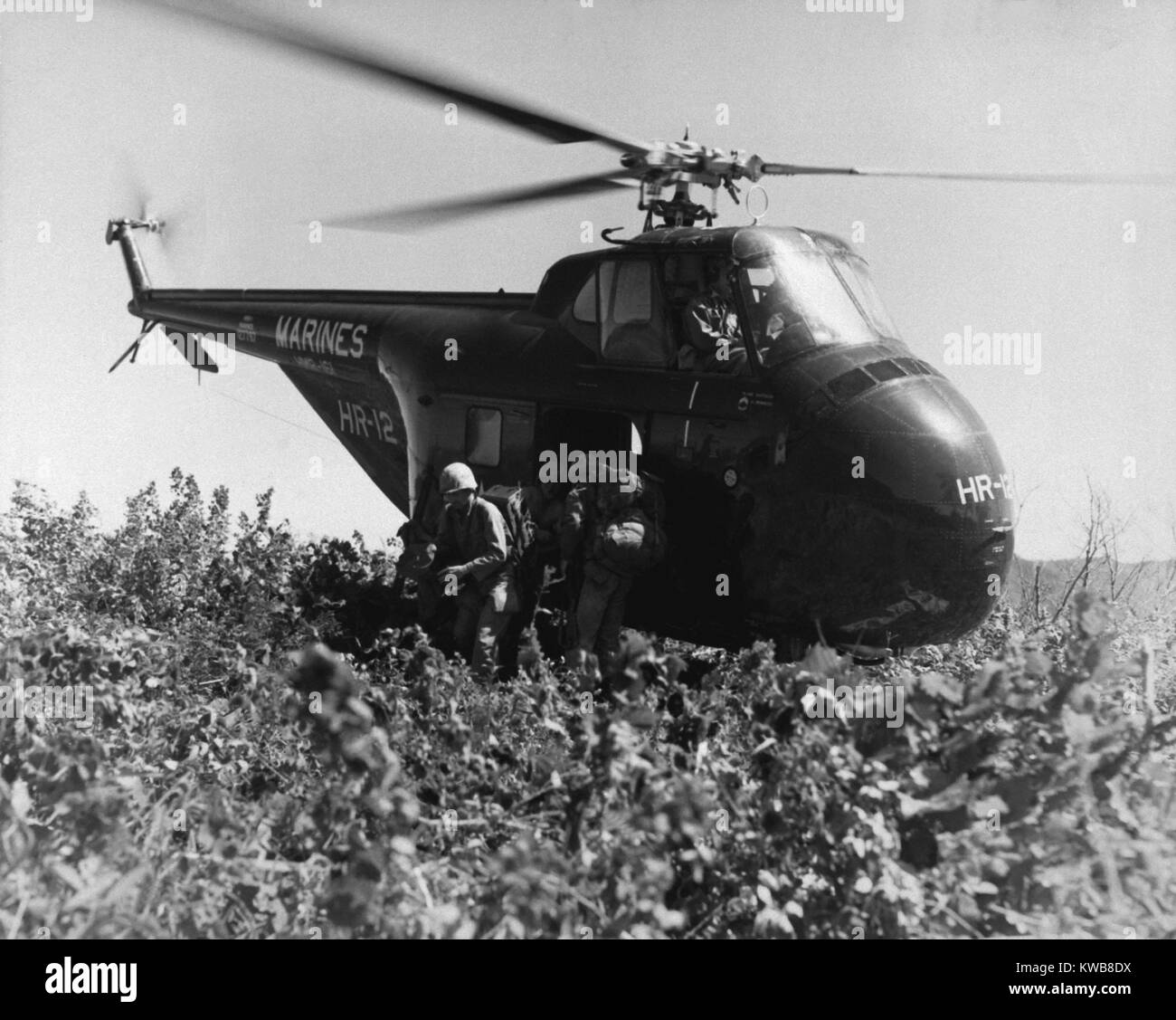 U. S. Marines make a helicopter invasion on Hill 812, to relieve the ROK (Republic of Korea) Eighth Division. Sept. 20, 1951. Helicopters were first used in wartime in during the Korean War. (BSLOC 2014 11 113) Stock Photo