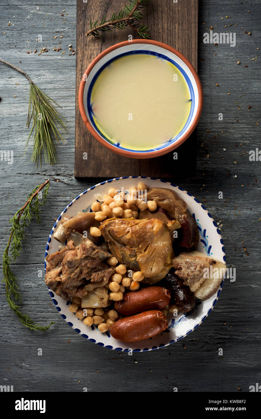 cocido madrileno, typical of Madrid, Spain, with the soup served in an