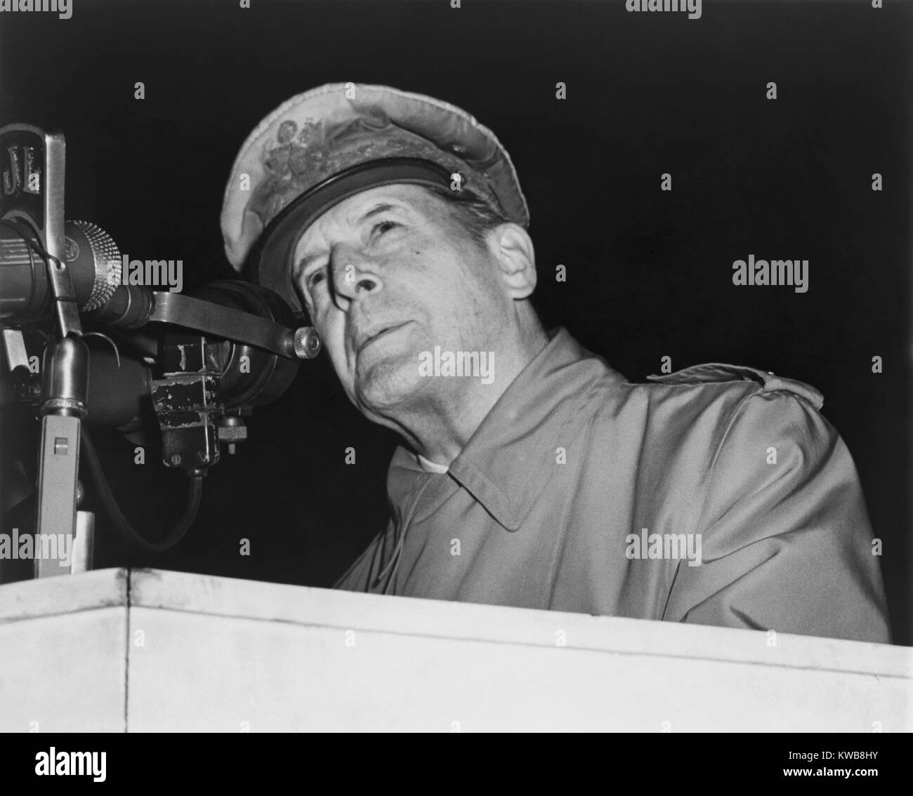 General Douglas MacArthur addressing an audience of 50,000 at Soldier's Field, Chicago on April 26, 1951. He simplified the complexities of the Korean War, advocating 'victory over the nation and men who, without provocation, have attacked us.' (BSLOC 2014 11 142) Stock Photo