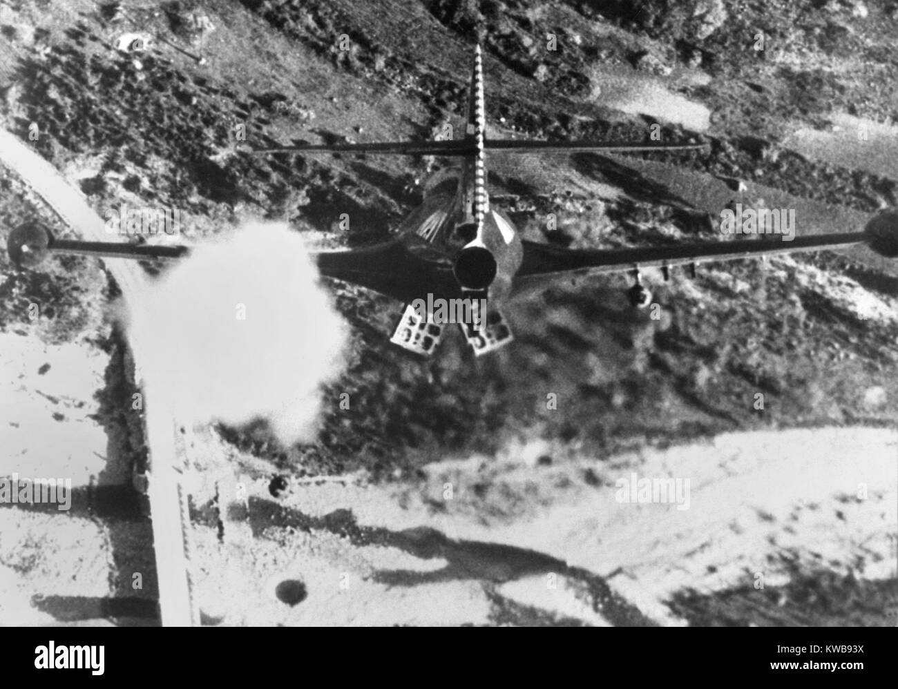 F-84 Thunderjet from the USS Bon Homme Richard, is shown rocketing and bombing Korean bridge. Nov. 11, 1952 during the Korean War. (BSLOC 2014 11 230) Stock Photo