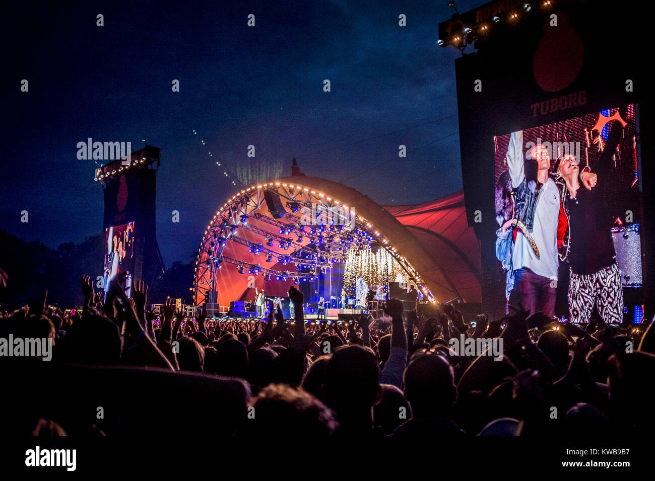 The area in front of the Orange Stage is packed with festival goers and music fans who attend one of many concerts at the Danish music festival Roskilde Festival 2016. Denmark, 30/06 2016. Stock Photo