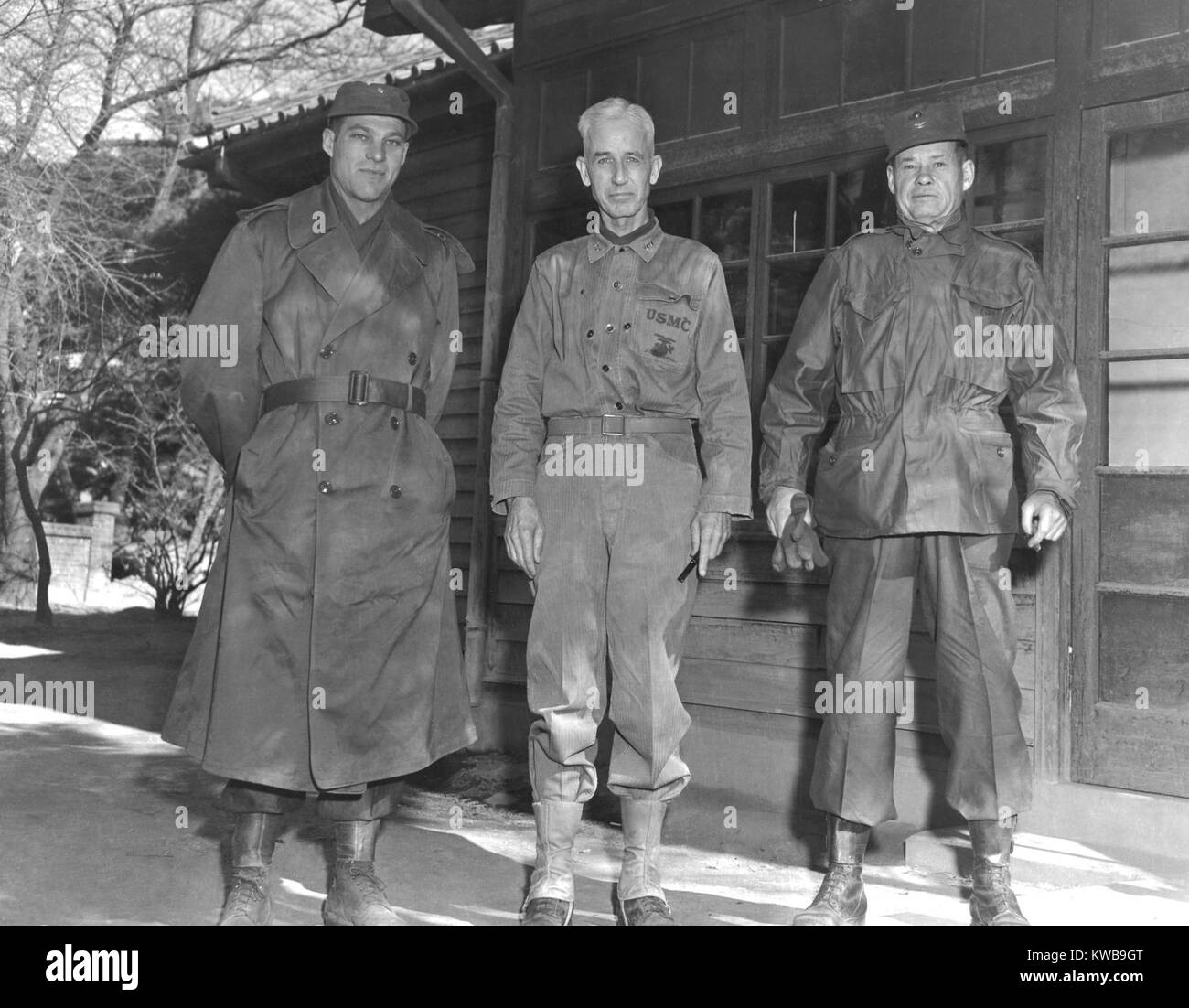 Major General Oliver Smith with Lieutenant Colonel Ray Murray, left, and Colonel Lewis Puller, right, Christmas, 1950. These three seasoned commanders lead their troops wisely in the face of unrealistic ambitions of the senior commanders Major Gen. Ned Almond and Commander in Chief, Douglas MacArthur. Korean War, 1950-53. (BSLOC 2014 11 98) Stock Photo
