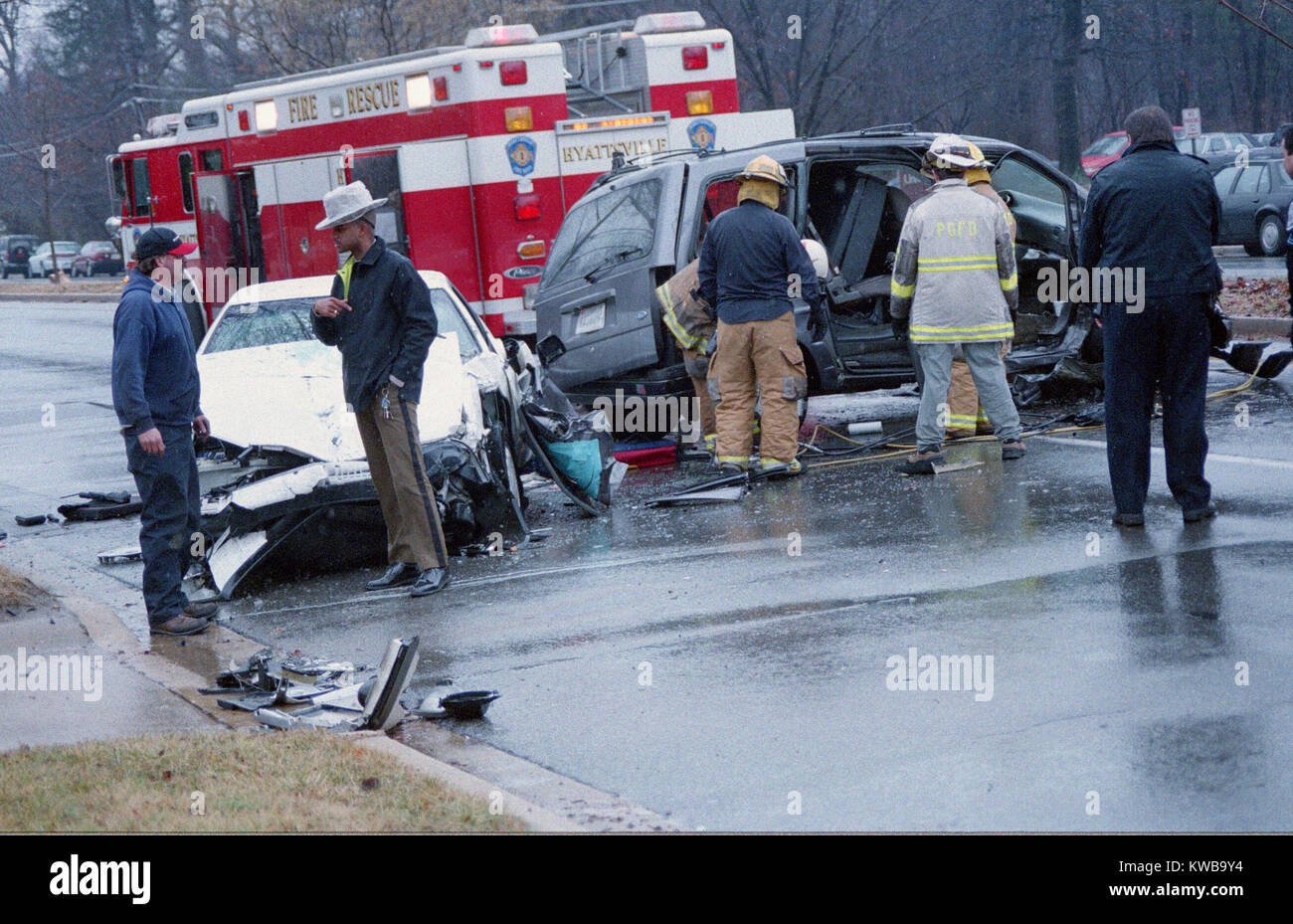 police and firefighters investigate an auto accident with injuries in Hyattsville, Maryland Stock Photo