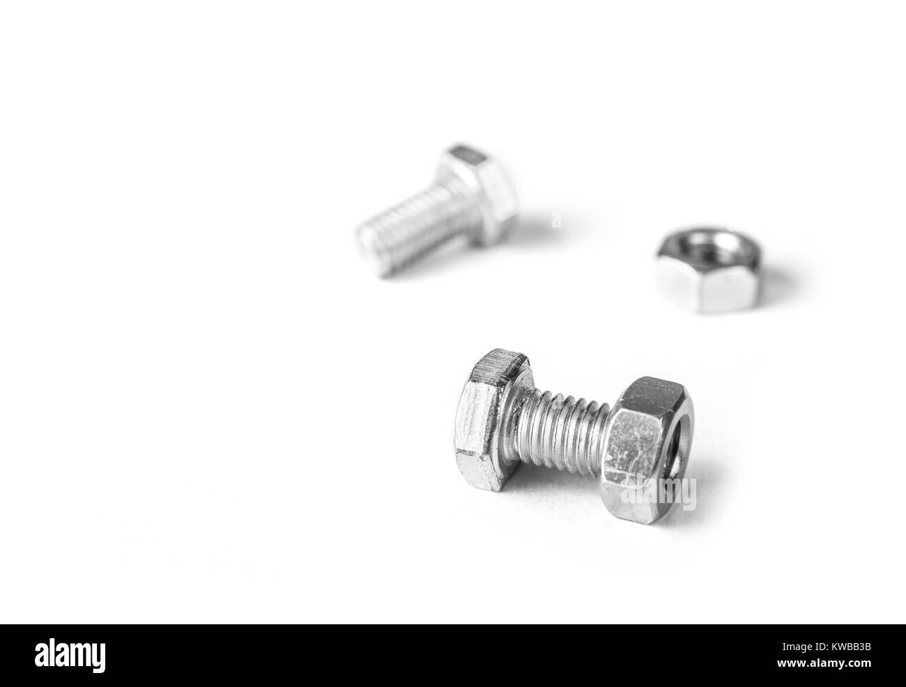 Bolts and nuts on the white background Stock Photo