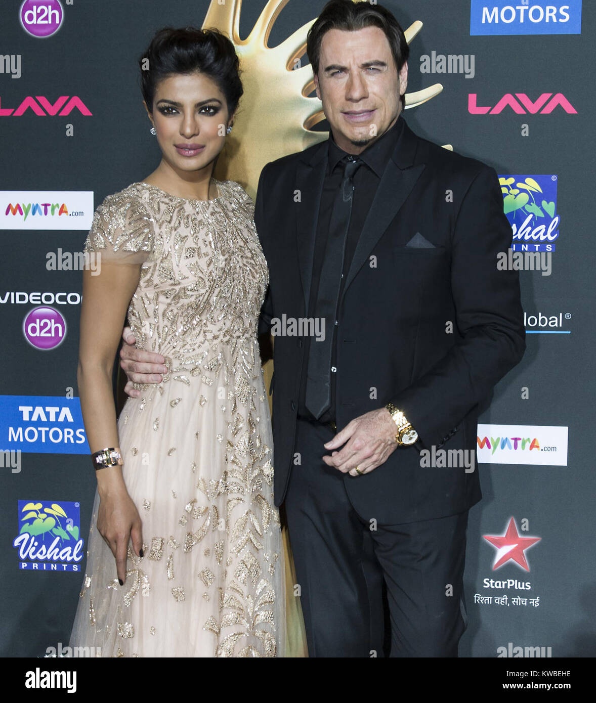 TAMPA, FL APRIL 26 John travolta, Priyanka Chopra arrives to the