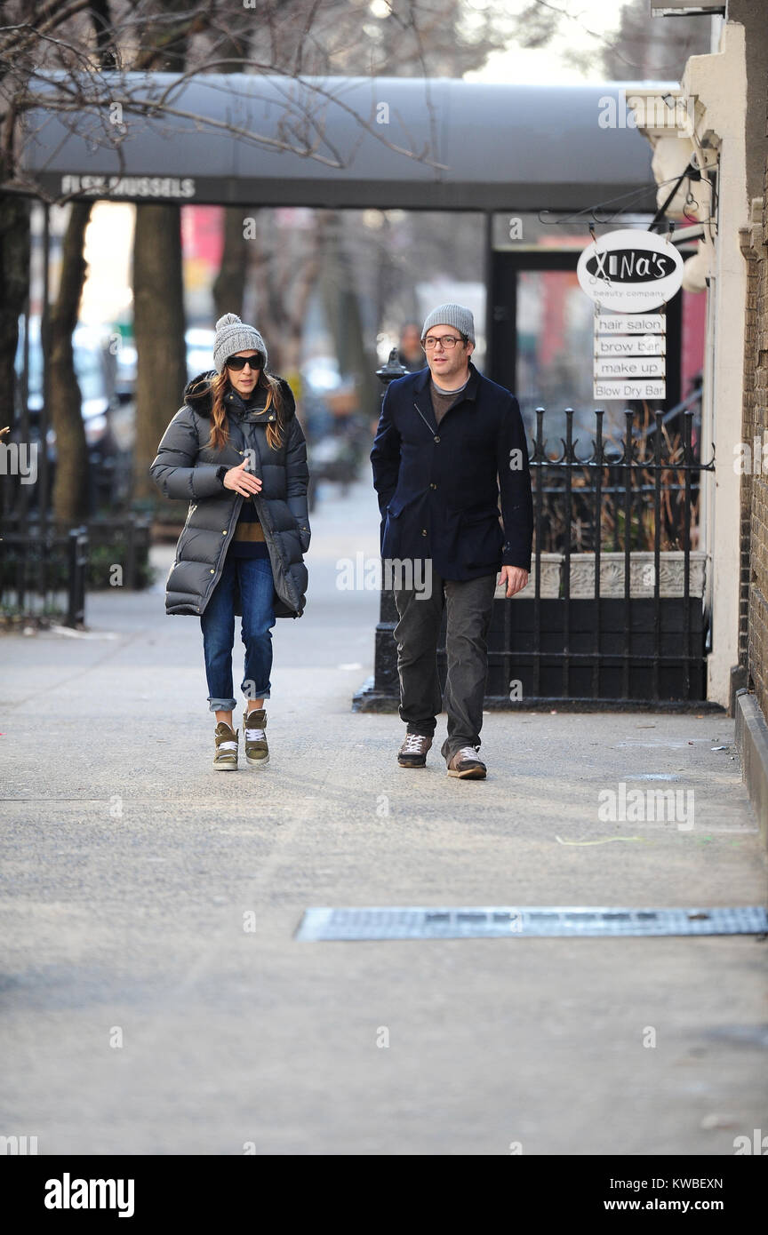 NEW YORK, NY - JANUARY 13: Matthew Broderick, Sarah Jessica Parker, James Wilkie Broderick, Tabitha Hodge Broderick and Marion Loretta Elwell Broderick are seen in the West Village on January 13, 2014 in New York City.    People:  Matthew Broderick_Sarah Jessica Parker Stock Photo