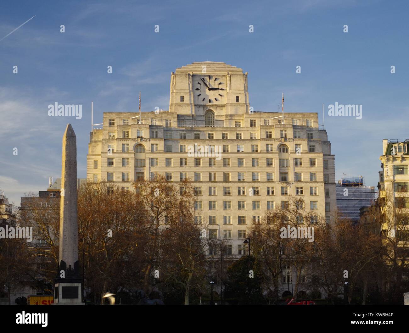 The Shell Mex Art Deco Building and Cleopatra's Needle. Victoria Embankment, City of Westminster, London, UK. In Golden Afternoon Sunlight. Dec 2017. Stock Photo