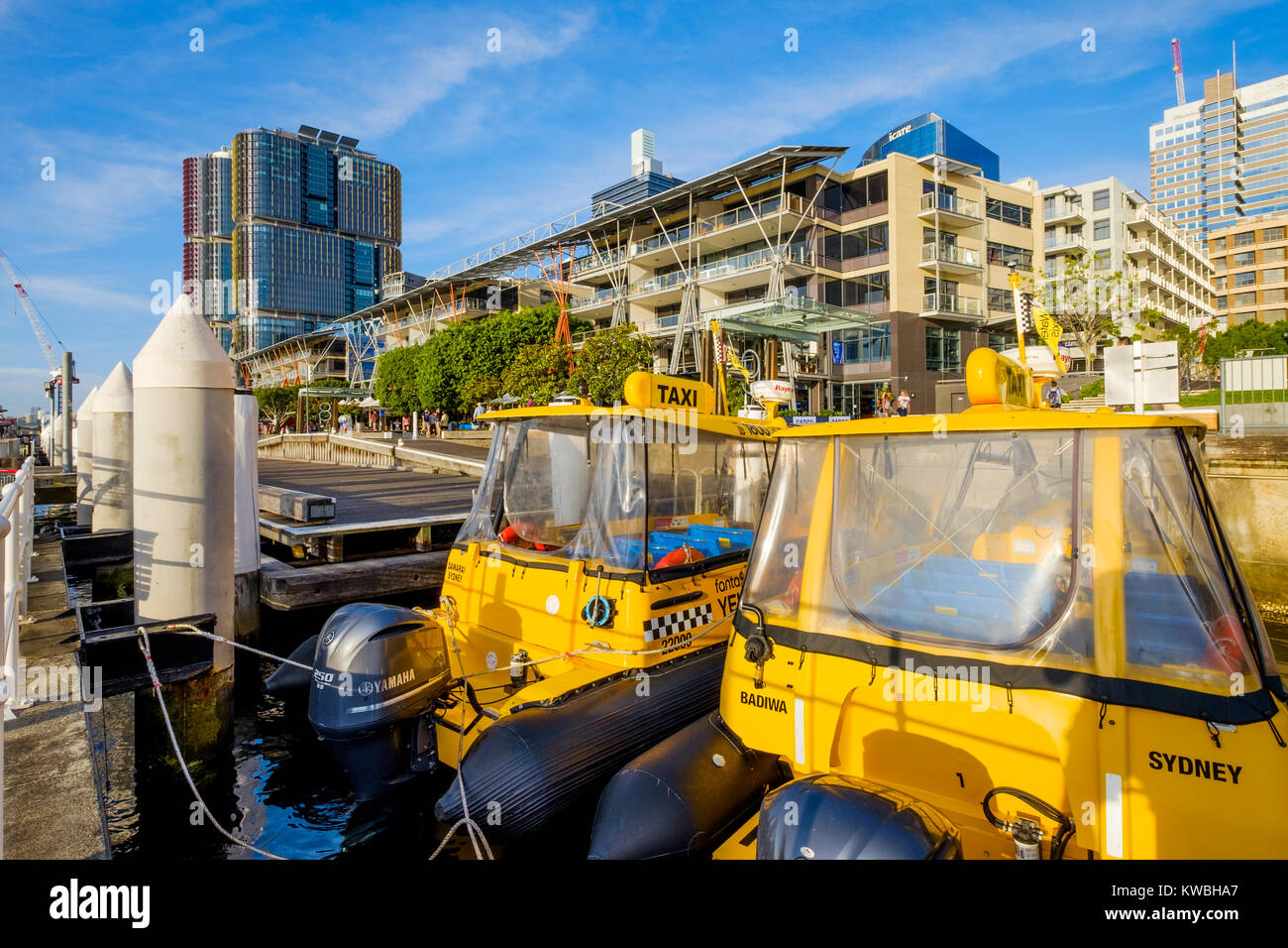 Yellow water taxi moored at Cockle Bay in Darling Harbour (Harbor), Sydney, Australia Stock Photo