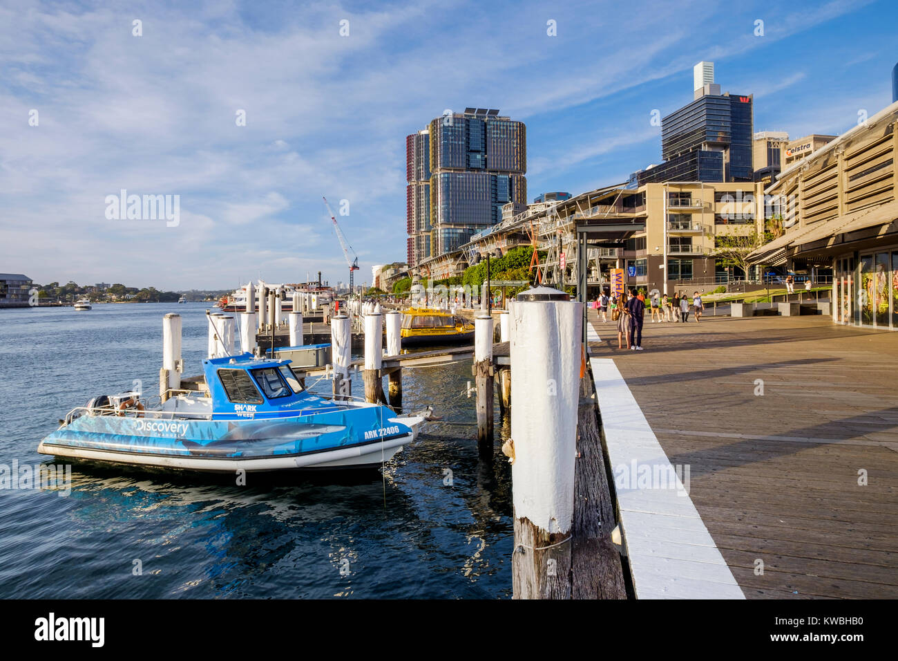 Motor boats and yellow water taxi moored at Cockle Bay in Darling Harbour (Harbor), Sydney, Australia Stock Photo