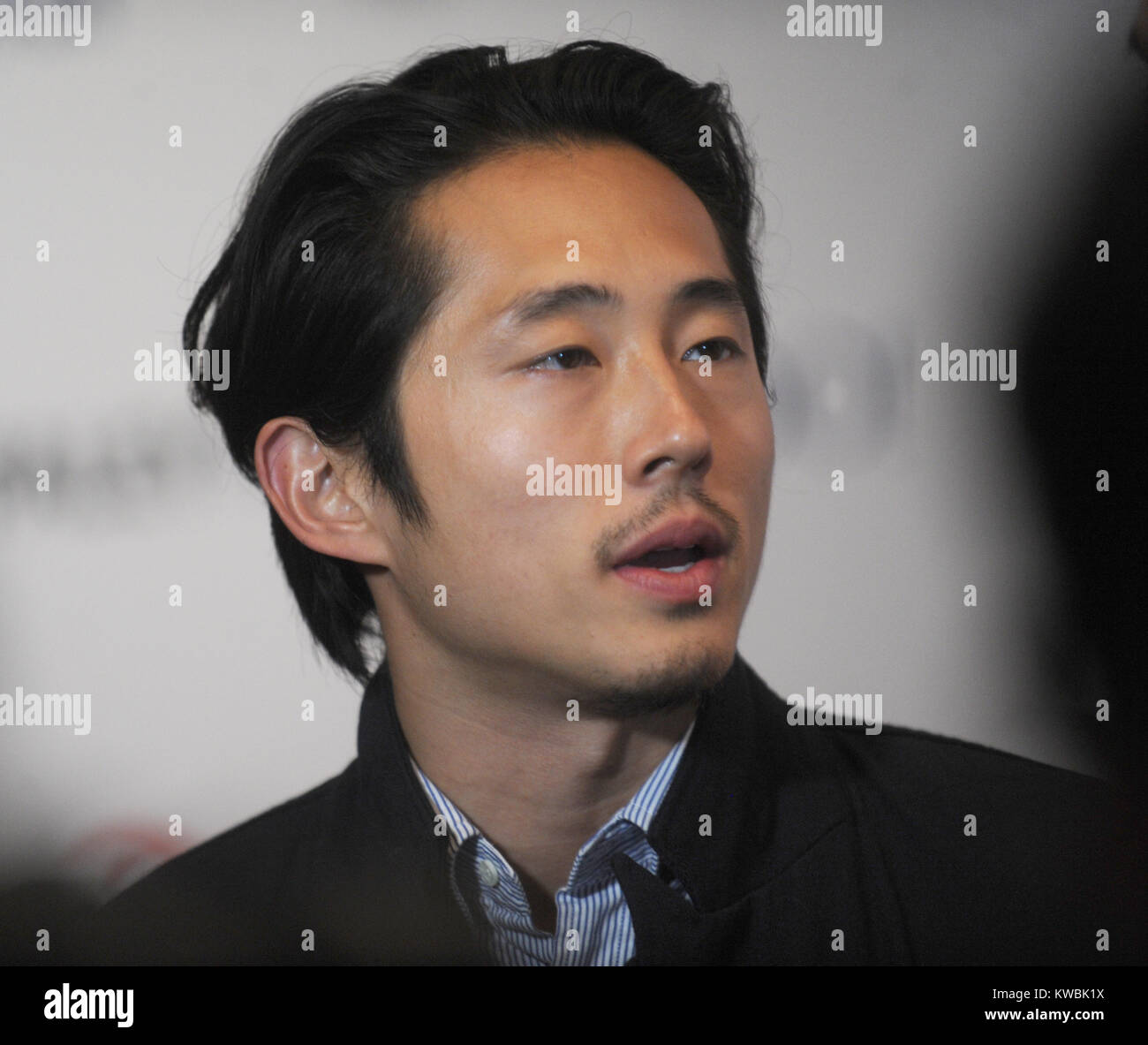 NEW YORK, NY - OCTOBER 11: Steven Yeun attends the 2nd Annual Paleyfest New York Presents: 'The Walking Dead' at Paley Center For Media on October 11, 2014 in New York, New York   People:  Steven Yeun Stock Photo