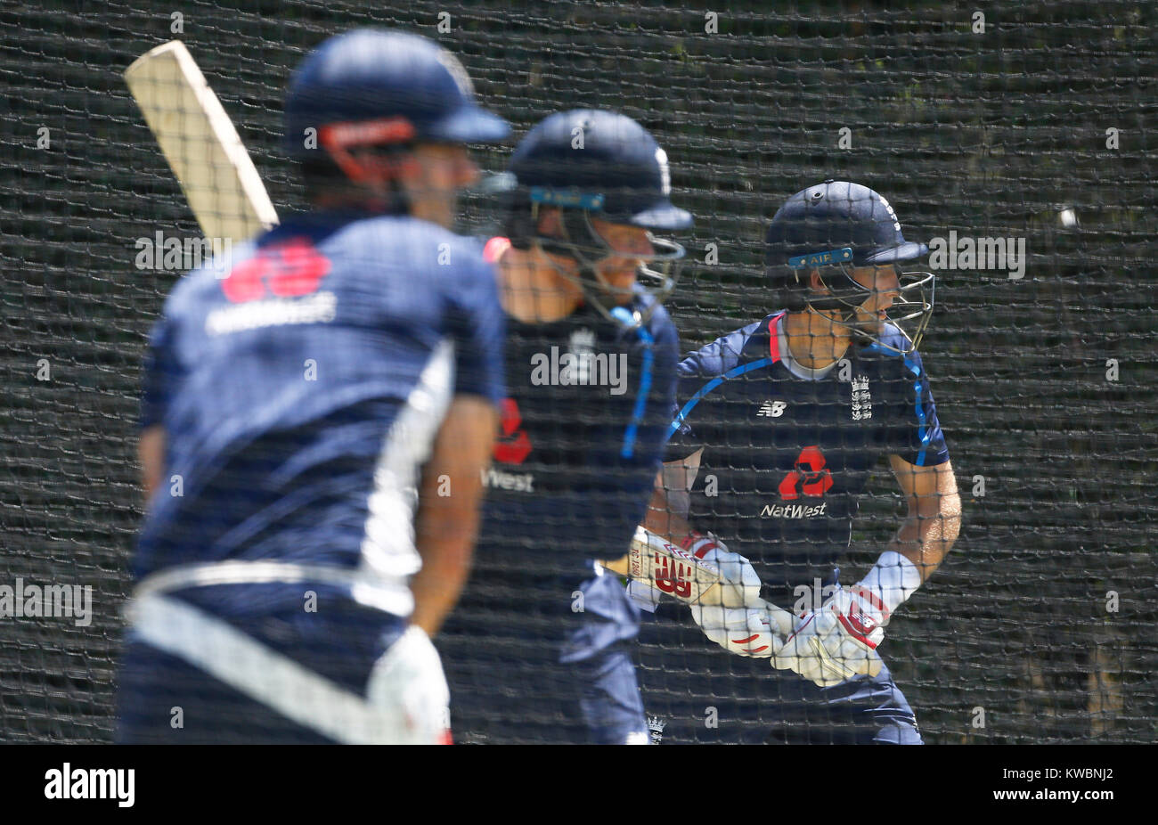 England's Joe Root ( right ) bats during a nets session at Sydney