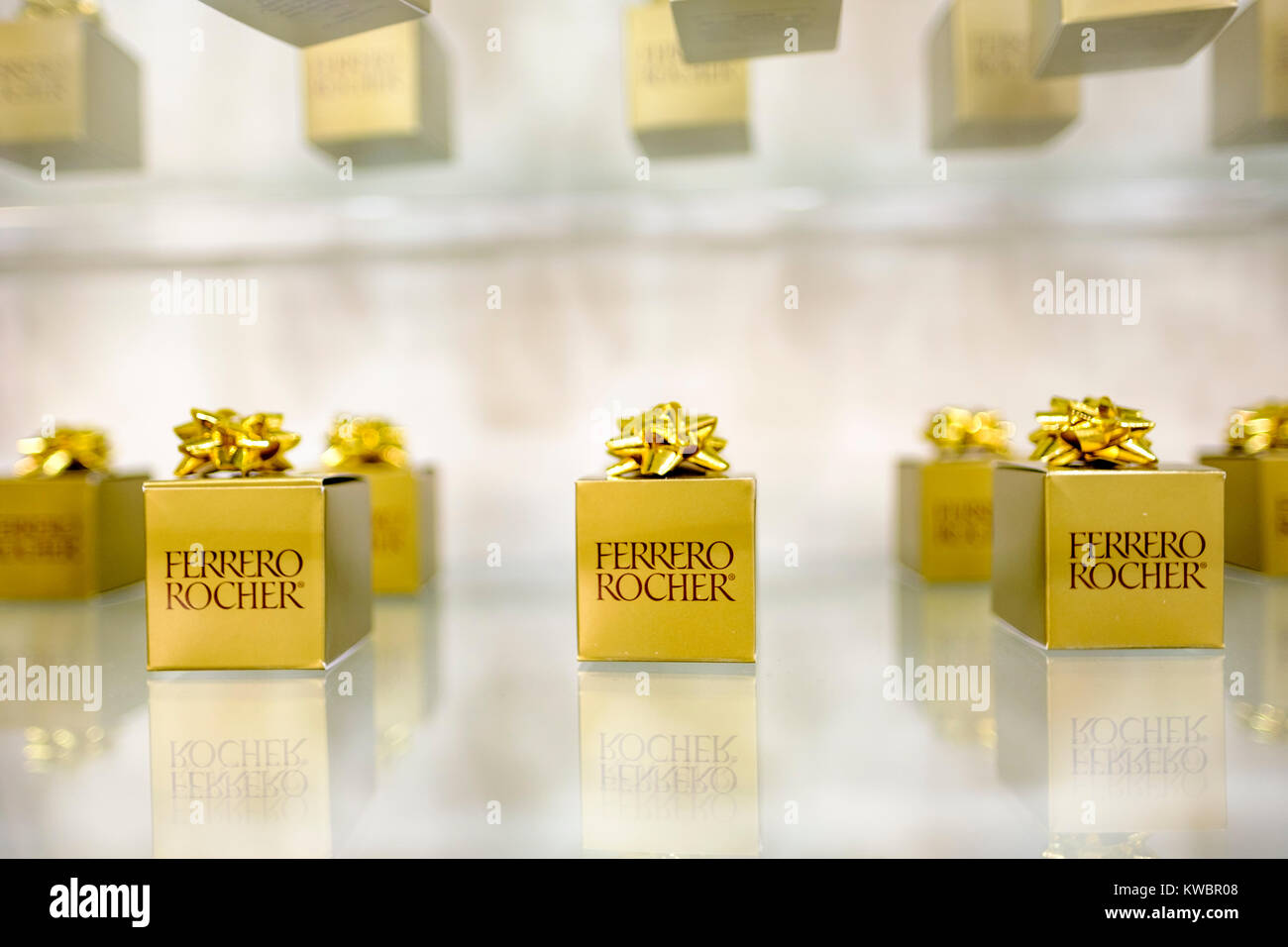 Store shelf displaying gift wrapped boxes of Ferrero Rocher chocolate during Christmas season at Yorkdale Shopping Centre, Toronto, Ontario, Canada. Stock Photo