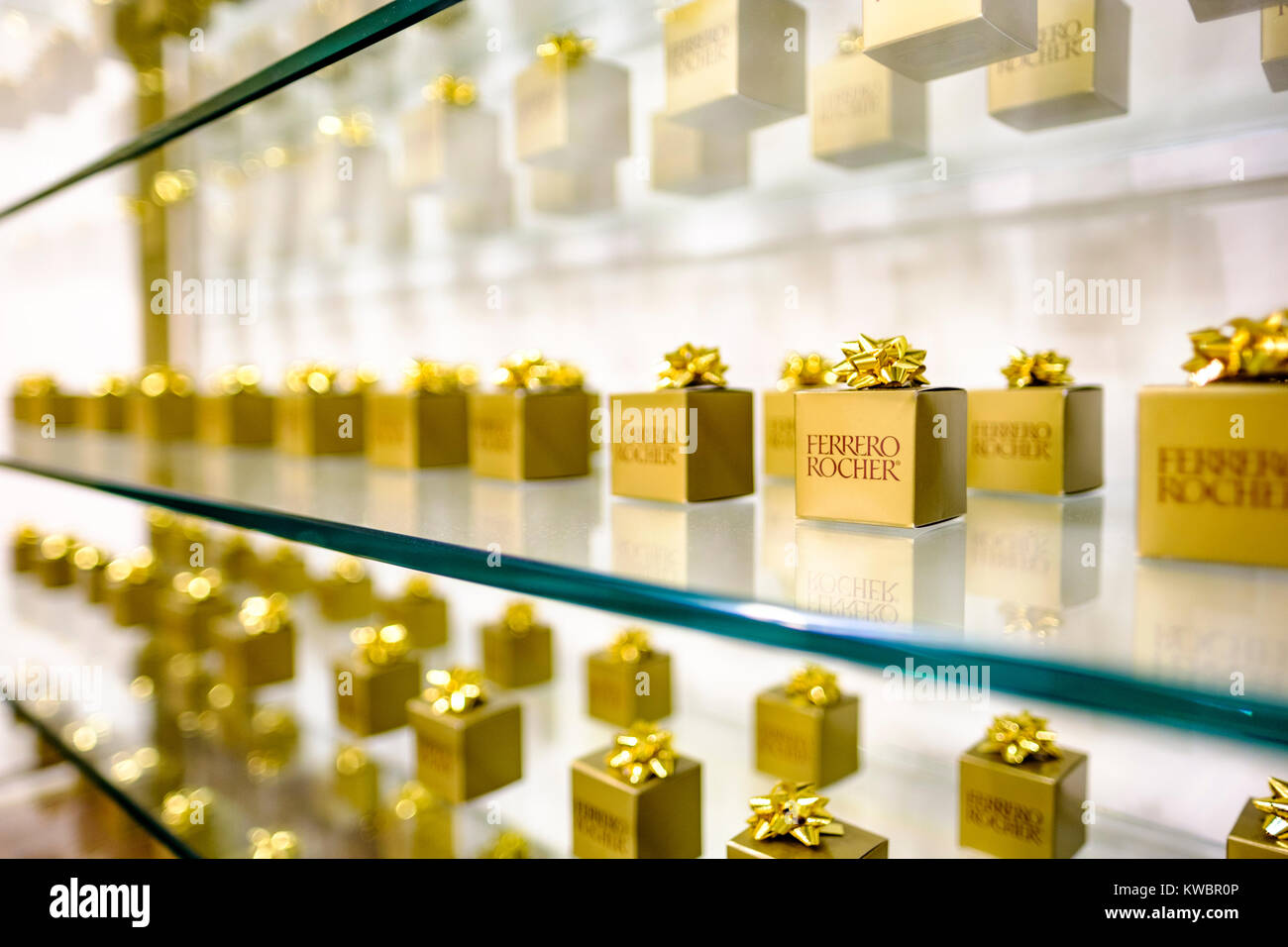 Store shelf displaying gift wrapped boxes of Ferrero Rocher chocolate during Christmas season at Yorkdale Shopping Centre, Toronto, Ontario, Canada. Stock Photo