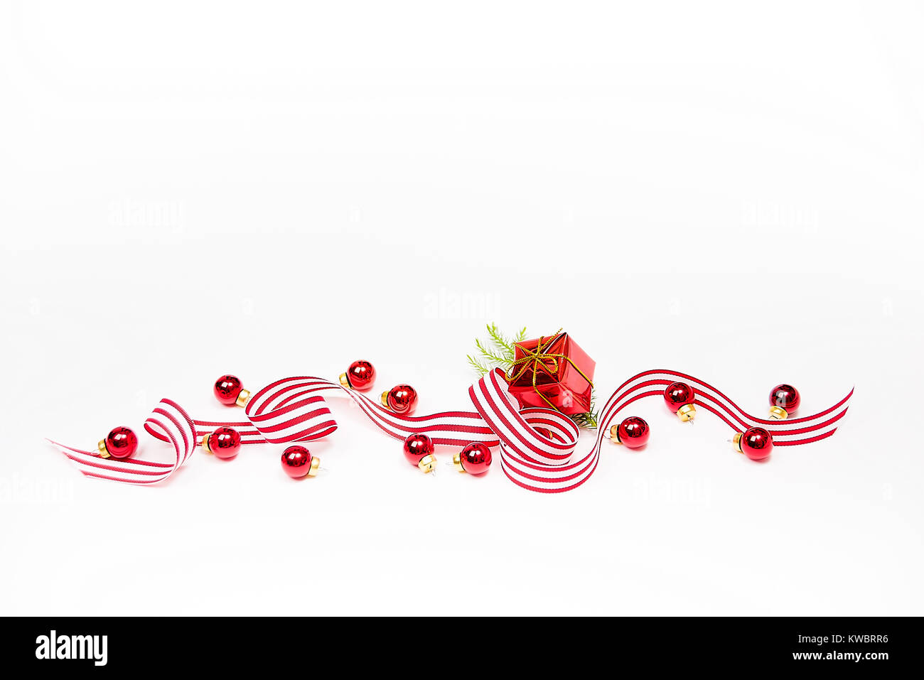 White and Red Striped Ribbon on White Background with Extra Space for