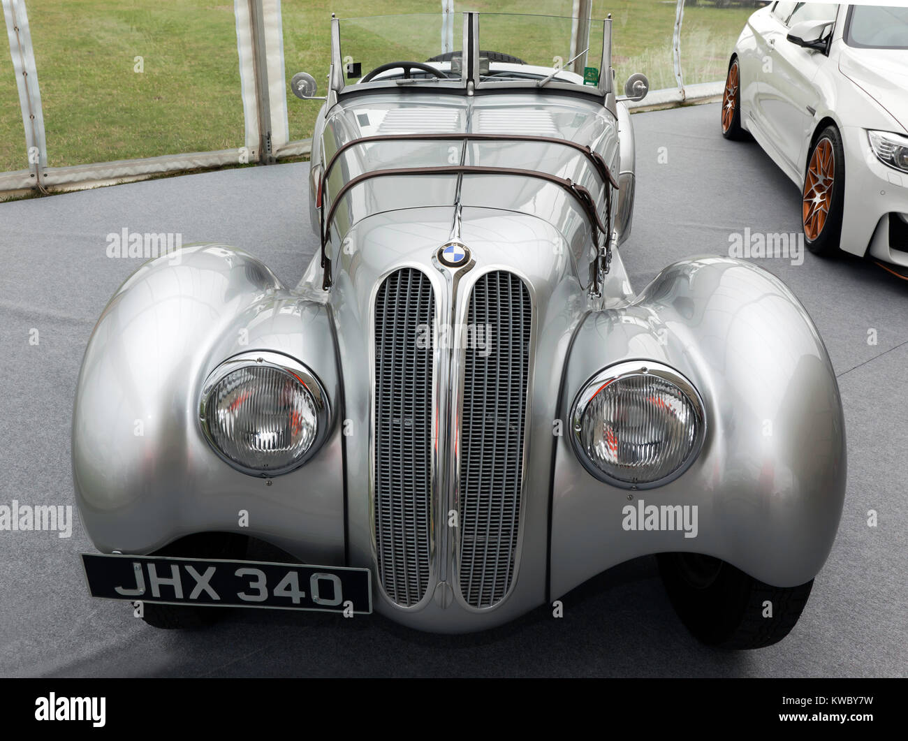 Front view of a 1933, Silver BMW 328  on static display in the BMW Car Club of great britian Ltd zone of the Silverstone Classic 2017 Stock Photo