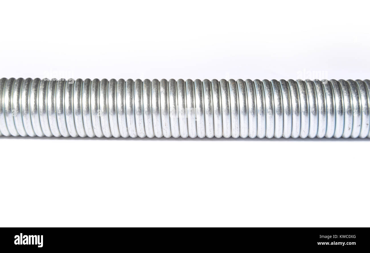 Silver, metal, shiny automotive springs on the white background Stock
