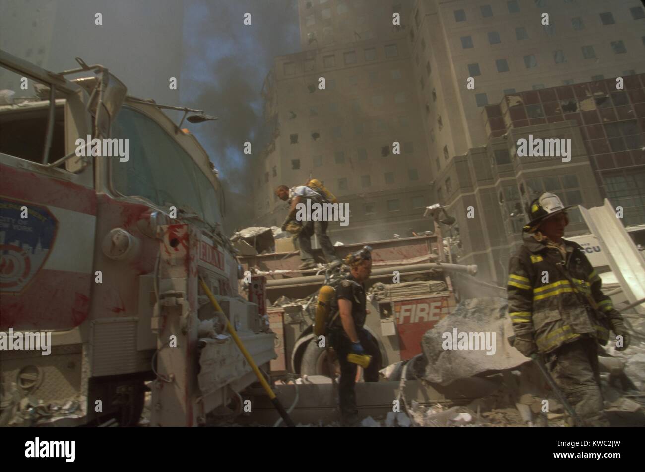 Wtc Fire Fire fighters amid debris following September 11th terrorist attack on ...