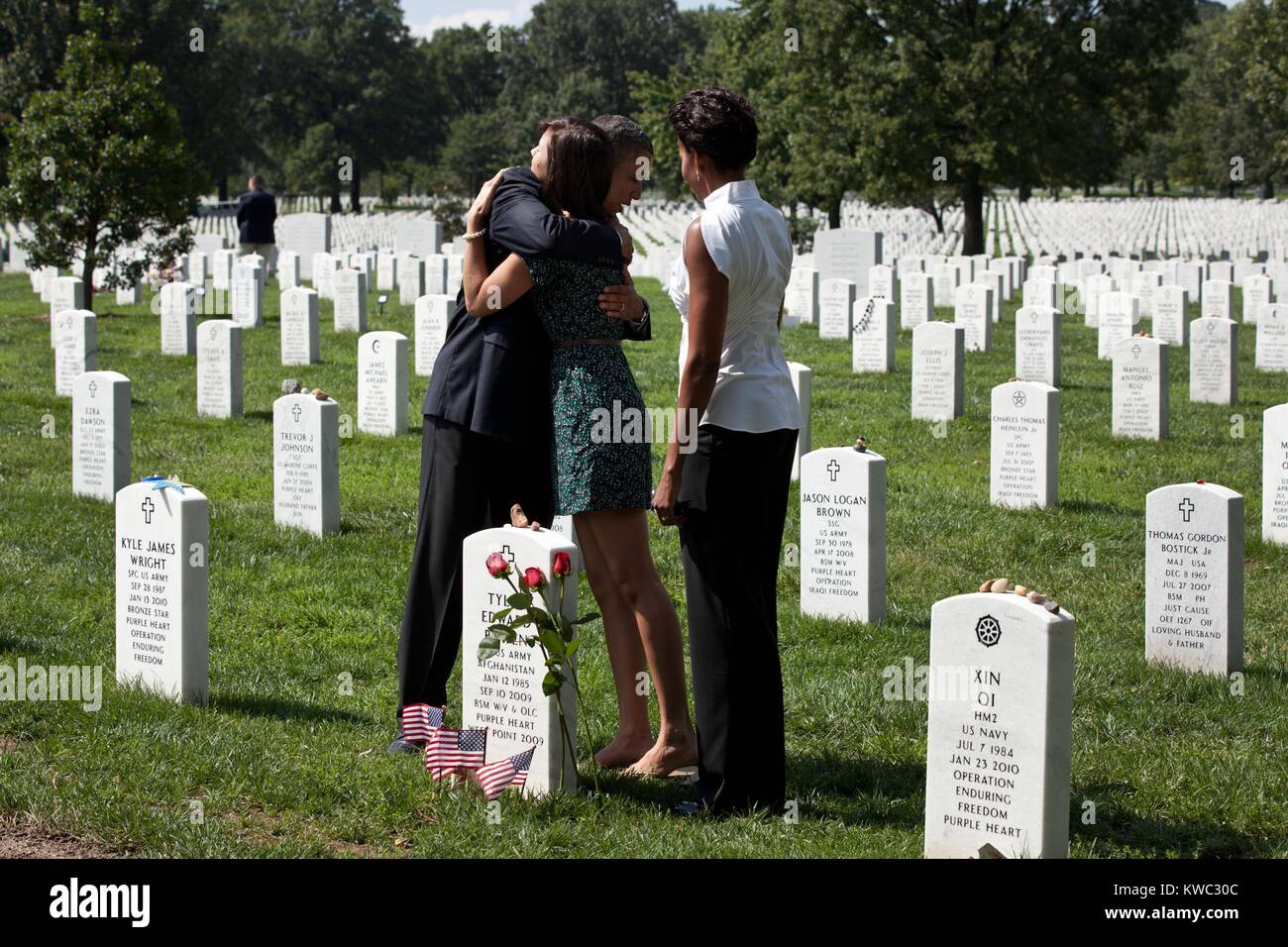 President Barack Obama in Section 60 of Arlington National Cemetery, Sept. 10, 2011. Section 60 is reserved for military personnel who have lost their lives while fighting in Afghanistan and Iraq. First Lady Michelle Obama is at right. (BSLOC 2015 13 162) Stock Photo