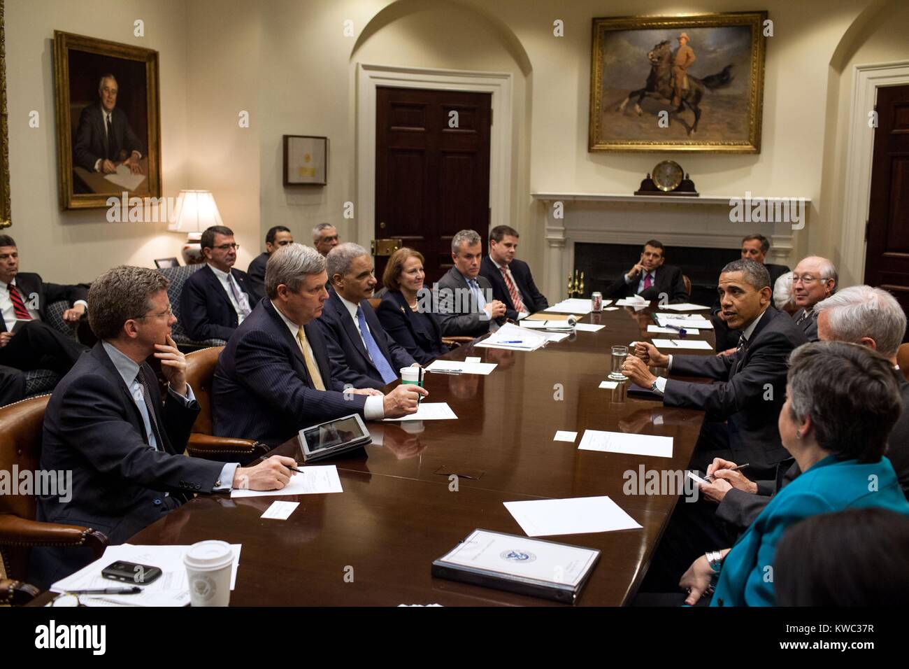 President Barack Obama meeting with 2nd Term Cabinet, April 26, 2012. Seated clockwise from President: John Bryson, Commerce; Janet Napolitano, Homeland Security; Shaun Donovan, Housing and Urban Development; Tom Vilsack, Agriculture; Eric H. Holder, Jr. Atty. Gen.; Karen Mills, Small Business Admin.; Jeff Zients, Office of Management and Budget acting Dir.; Dan Pfeiffer, Director of Communications; David Plouffe, Senior Advisor ; Mark Childress, Dep. Chief of Staff for Planning; Kathleen Sebelius, Health and Human Services; and Interior Ken Salazar, Interior. (BSLOC 2015 13 242) Stock Photo