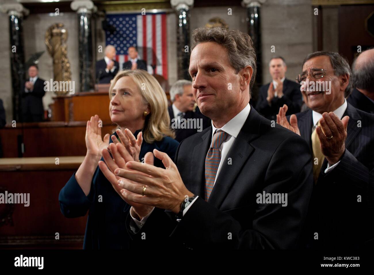 Senior Cabinet members applaud President Obama at the Capitol. L-R: Sec. of State Hillary Clinton; Treasury Sec. Timothy Geithner; and Defense Sec. Leon Panetta. Sept. 8, 2011. Obama addressed a Joint Session of Congress detailing the American Jobs Act. (BSLOC 2015 13 247) Stock Photo