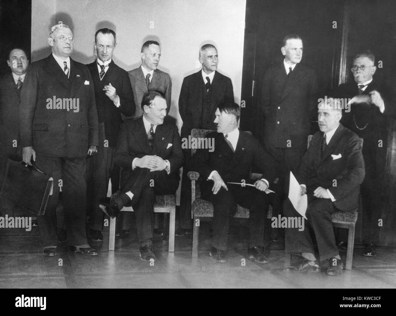 Adolf Hitler and his Cabinet, January 30, 1933, the day he became Prime Minister of Germany. Seated, L-R: Goering, without portfolio, Adolf Hitler, Chancellor; von Papen, Vice-Chancellor. Standing, L-R: Franz Seldt, Labor; Walther Funk, Under-Secretary Propaganda; Guenther Gereke, Reich Commissioner of the Eastern Territories, Lutz Graf Schwerin von Krosigk, Finance; Wilhelm Frick, Domestic Affairs; Werner von Blomberg, Reichswehr-Army; Alfred Hugenberg, Economy and Nutrition. (BSLOC_2015_13_43) Stock Photo