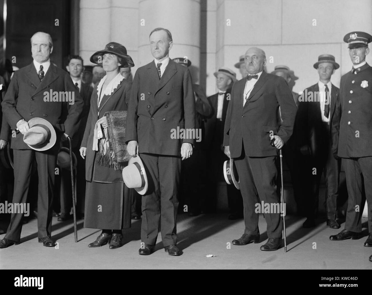 New President Calvin Coolidge and his wife Grace arrived in Washington DC on Aug. 3, 1923. They were welcomed by Secretary of State Charles Evens Hughes the day following the death of President Warren Harding. (BSLOC_2015_15_103) Stock Photo