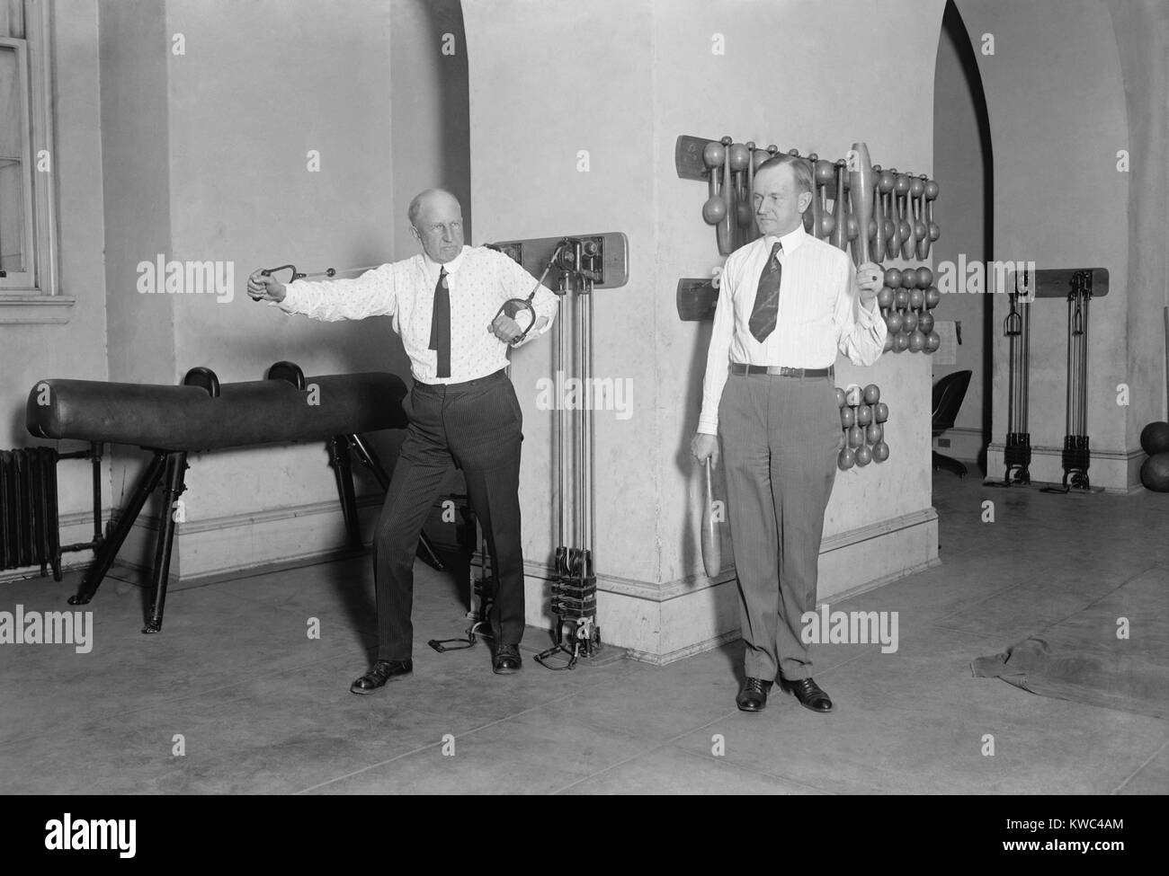 Vice President Calvin Coolidge working out with Speaker Fred Gillet in the Capitol Gym. Jan. 31, 1923. Like Coolidge, Gillett was a western Massachusetts Republican. He ran for the Senate in 1924 and won with the help of Coolidge's Republican landslide. (BSLOC 2015 15 151) Stock Photo