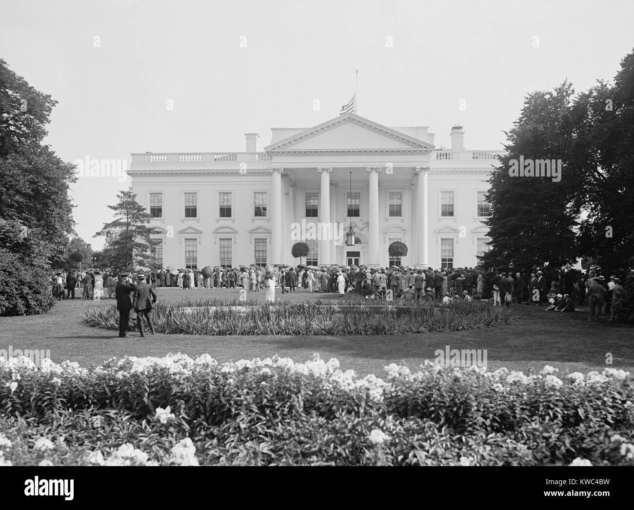 Lafayette Park after the death of Calvin Coolidge, Jr., the President's 16 year old son. People gather at Lafayette Square, across the street from the North Portico of the White House, ca. July 8-10. (BSLOC 2015 15 166) Stock Photo