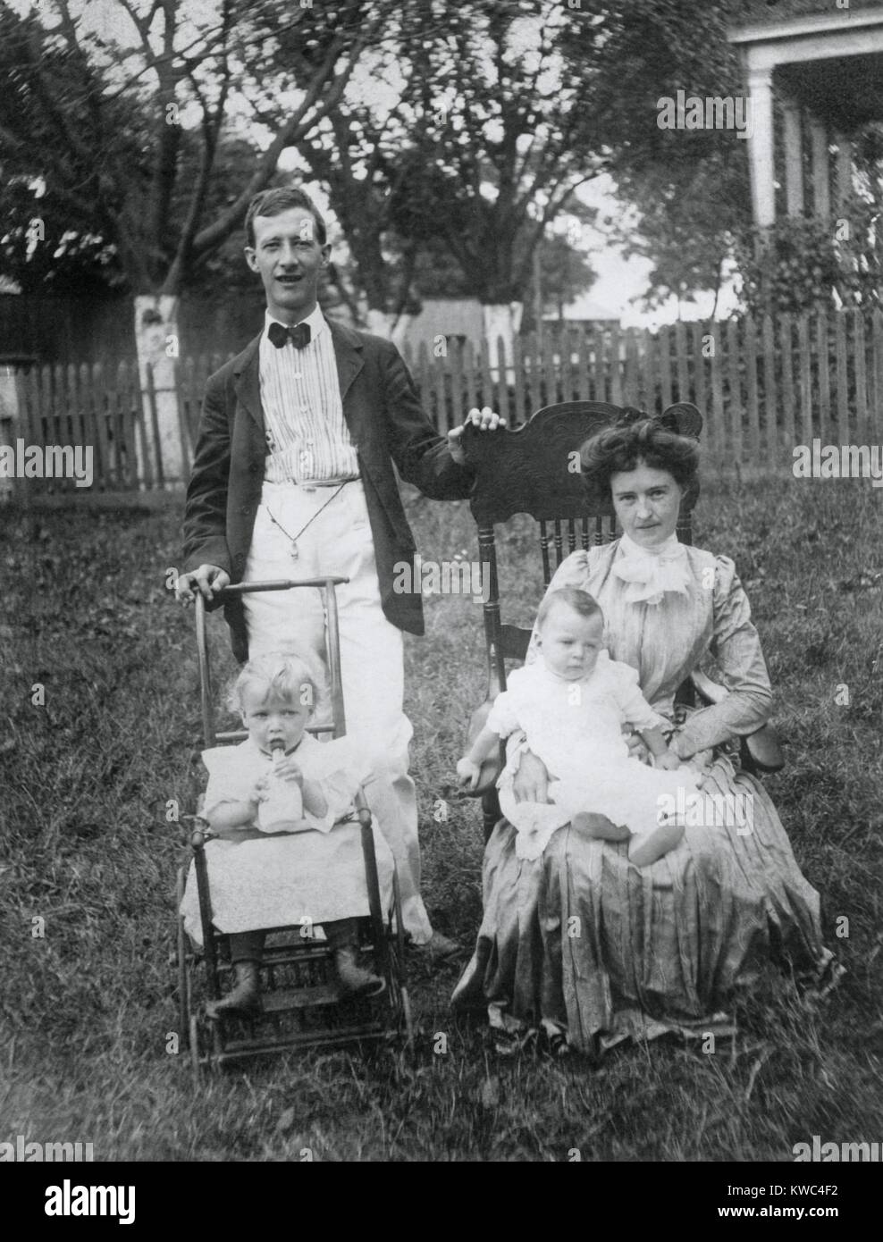 Alfred E. Smith at the age of 27 with his wife, Catherine Ann Dunn Smith and two babies. Ca. 1900. (BSLOC 2015 15 202) Stock Photo
