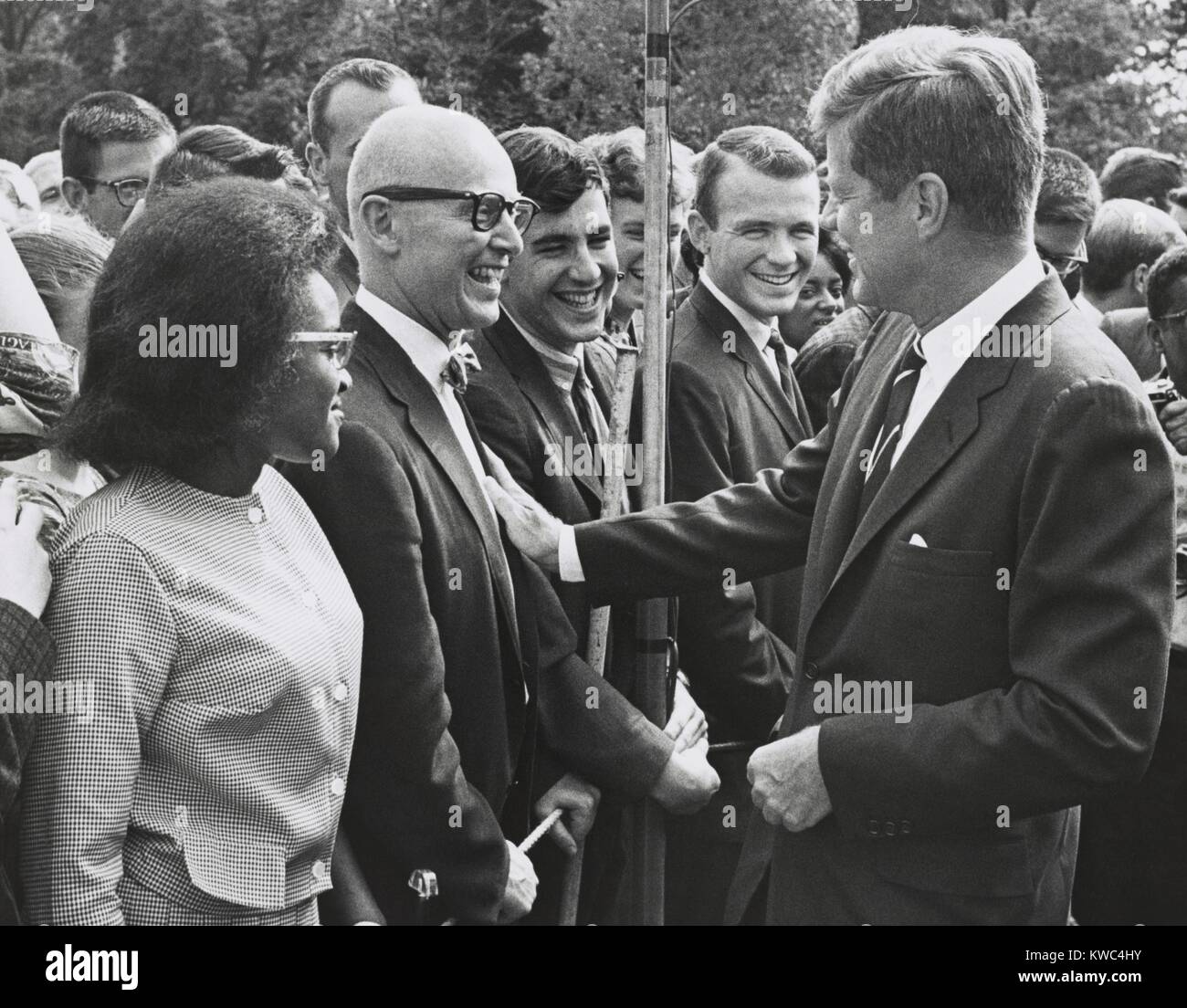 President John Kennedy meets with one of the first groups of Peace Corps volunteers. White House lawn, Aug. 21, 1961. (BSLOC 2015 2 225) Stock Photo