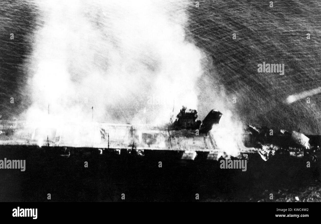 Battle of Midway, June 3-7, 1942. Japanese aircraft carrier Hiryu (Flying Dragon), abandoned and burning after attacks by dive bombers from USS Yorktown and Enterprise. World War 2. (BSLOC 2015 13 117) Stock Photo