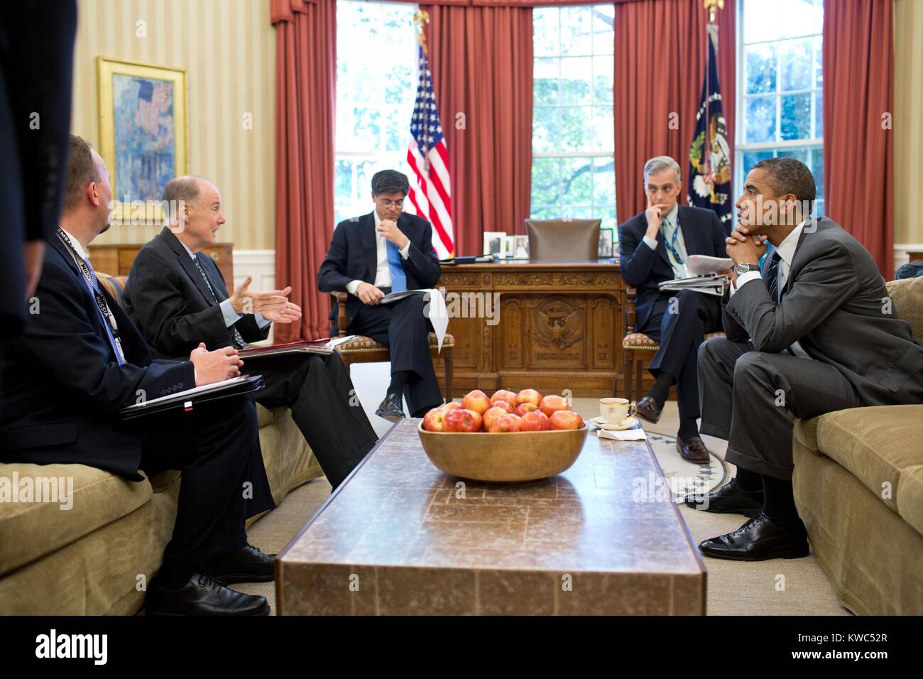 President Barack Obama's senior advisors before a phone call with Russia's Vladimir Putin. July 18, 2012. From left: Chris Mizelle, Dir. For Russia and Central Asia, NSS; National Security Advisor Tom Donilon; Chief of Staff Jack Lew; and Denis McDonough, Deputy National Security Advisor. (BSLOC 2015 13 259) Stock Photo