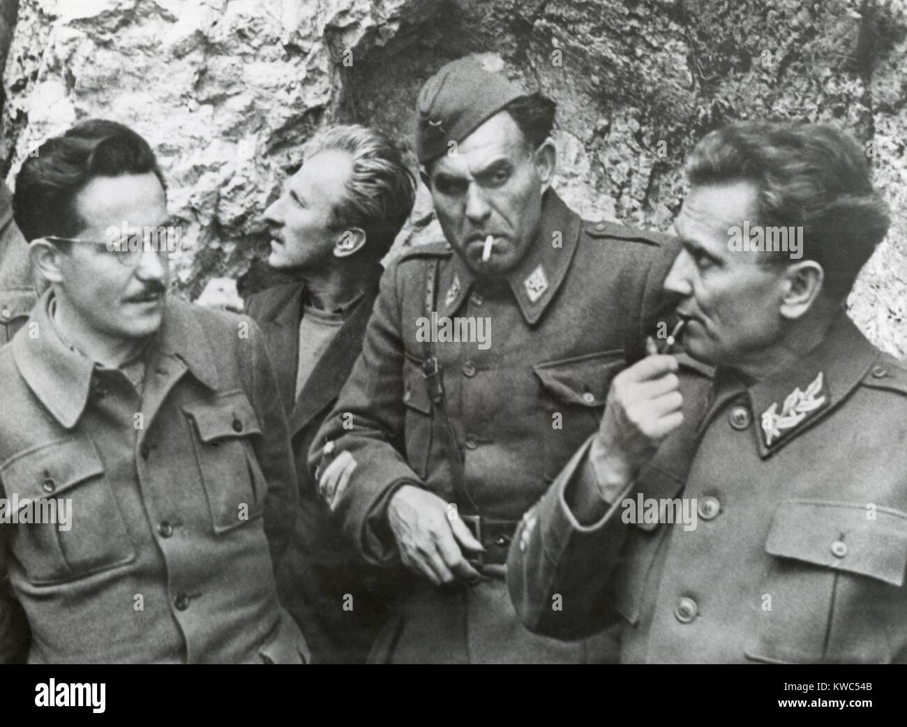 Yugoslav partisan Marshall Tito with two of his staff, Kvard Kardelt (L) and Gen. Sreten Zujevich. May 1944, at his remote mountain headquarters. (BSLOC 2015 13 34) Stock Photo
