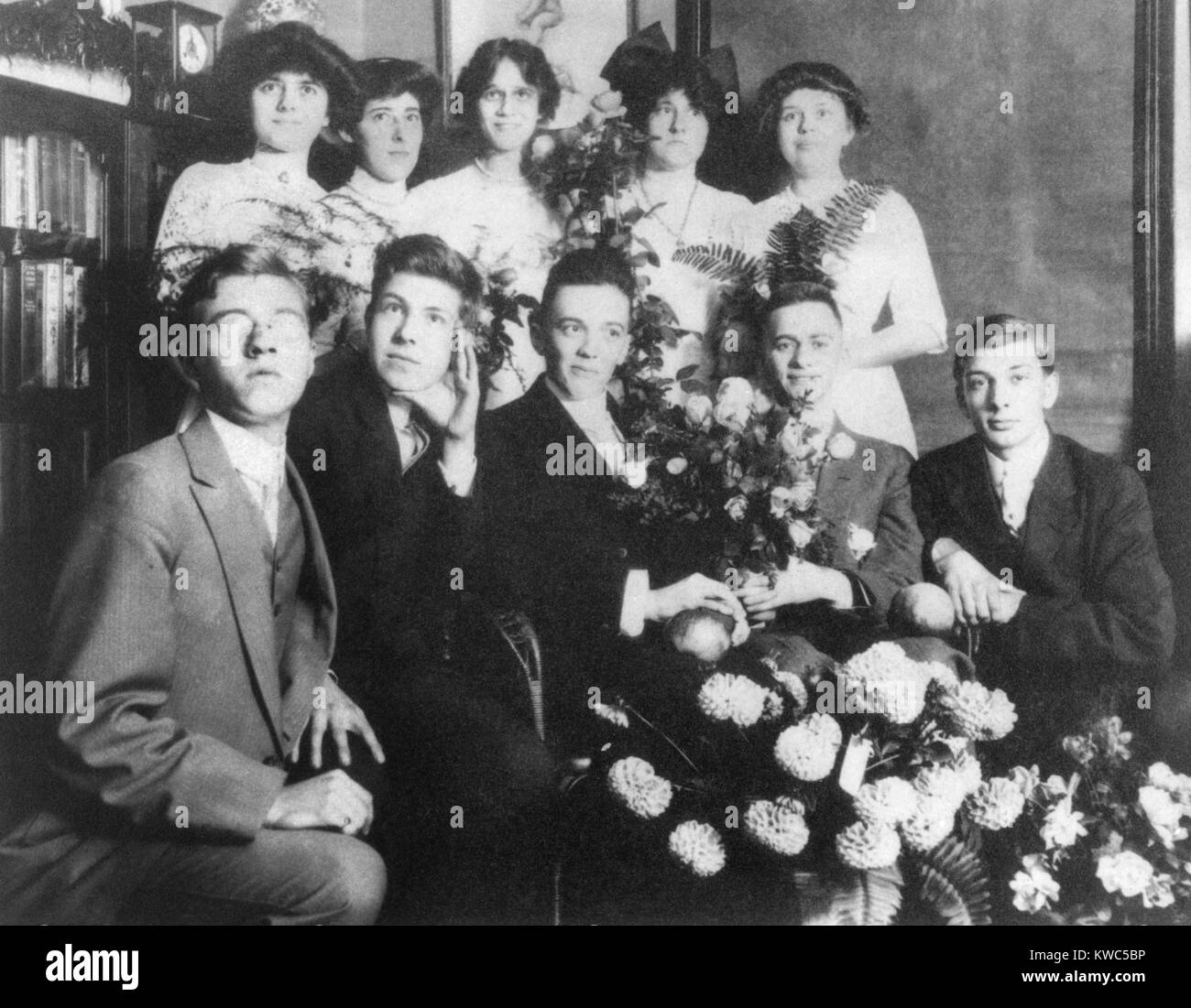 Young J. Edgar Hoover with a group of teenagers, ca. 1912. The flowers and nice clothes suggest an important occasion, perhaps high school graduation from Central High, in Washington, D.C. (BSLOC 2015 14 21) Stock Photo