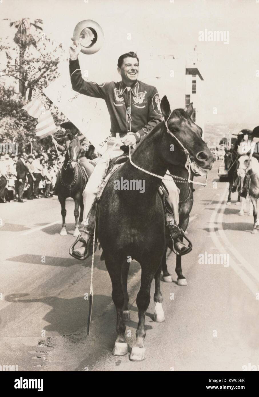 Ronald Reagan, newly elected Governor of California, riding a horse in a parade. Dec. 1966. (BSLOC 2015 14 74) Stock Photo