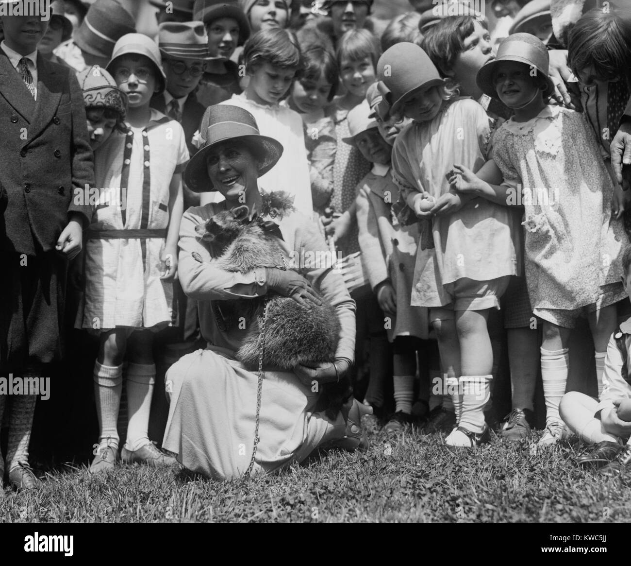 First Lady Grace Coolidge with her pet raccoon, Rebecca, at the White ...