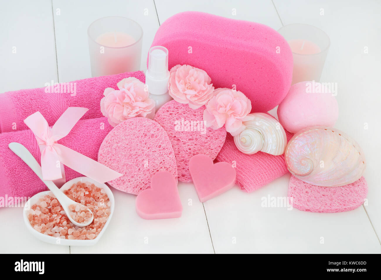 Spa and bathroom beauty treatment accessories including pink carnation