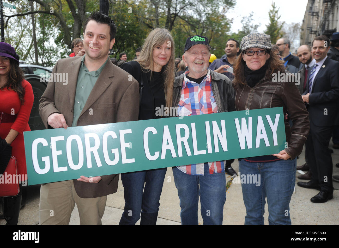 NEW YORK, NY - OCTOBER 22: Al Jones, Colin Quin, George Carlin, George Carlin Way, Gilbert Gottfried, Judah Friedlander, Marla Diamond, Morningside Heights, Robert Klein, and relatives of late stand-up comedian George Carlin mark the renaming of a street as 'George Carlin Way' at Morningside Avenue and 121st Street on October 22, 2014 in New York City.  People:  George Carlin Way Stock Photo